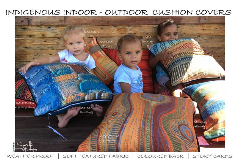 Babies enjoying Aboriginal design on cushion cover. Koyiyoong Campsite is a orange cushion cover