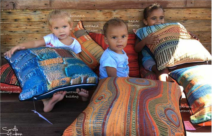 Lifestyle image featuring the Koyiyoong (Campsite) Aboriginal Cushion Cover by Saretta Fielding